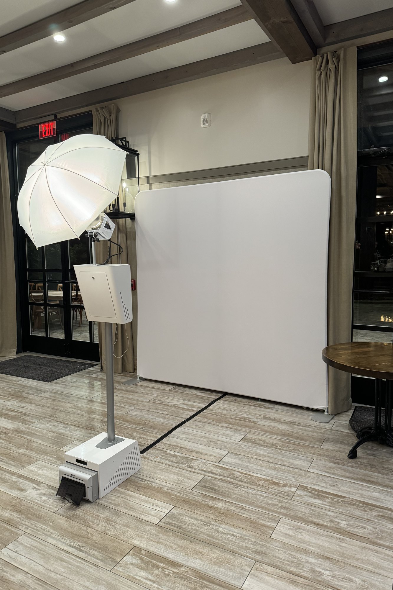 The booth built and lit in an empty venue before guests arrive